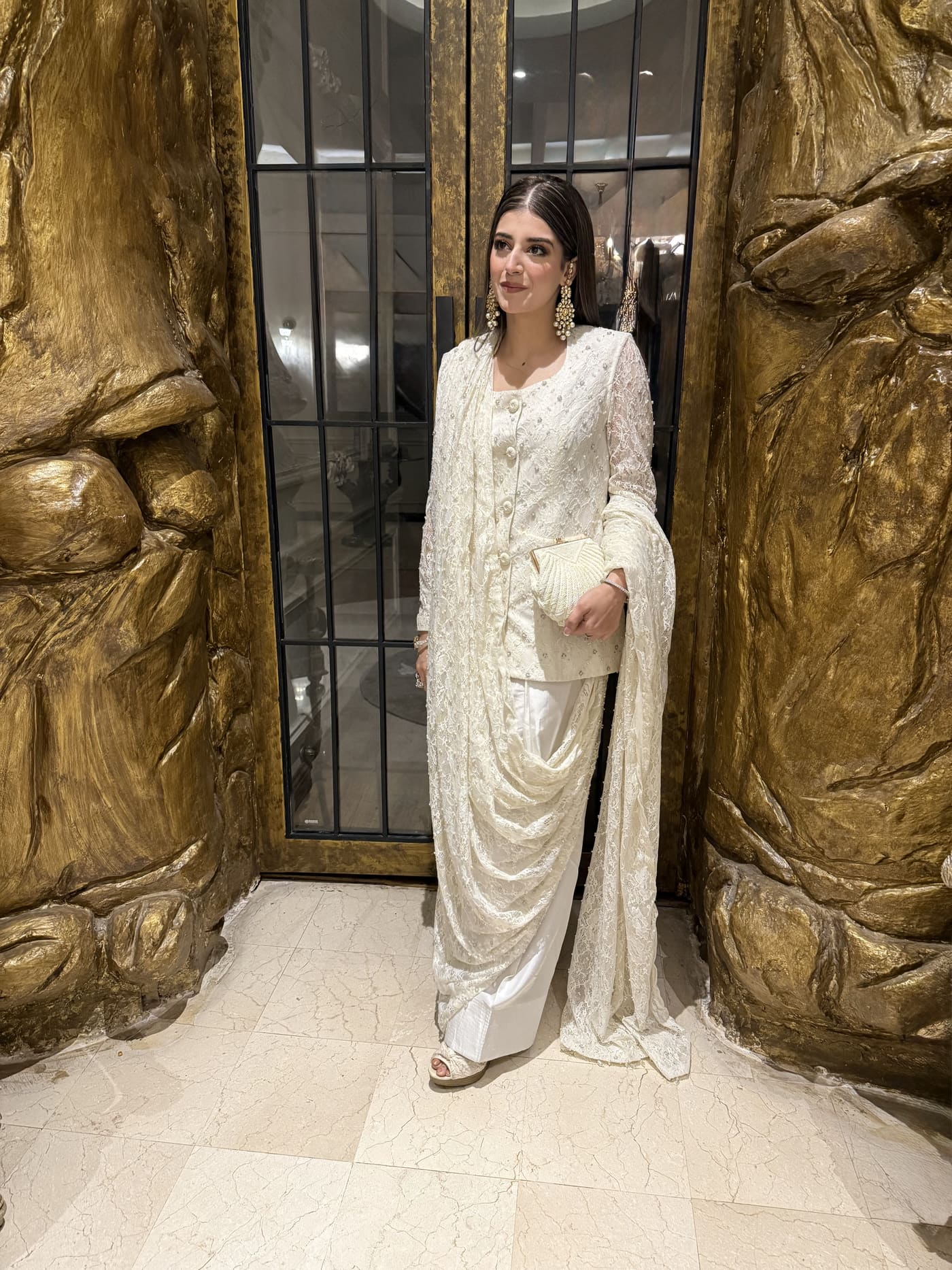 Ivory embroidered jacket with draped skirt